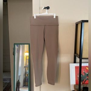Tan PowerHold leggings by Fabletics women’s size Small
